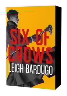 A 3D bookshot of the new anniversary paperback edition of Six of Crows by Leigh Bardugo - featuring black sprayed edges!