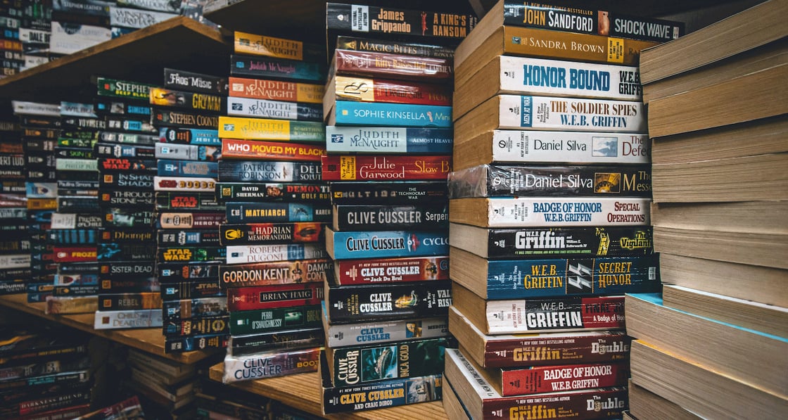 Stacks of mass market paperbacks