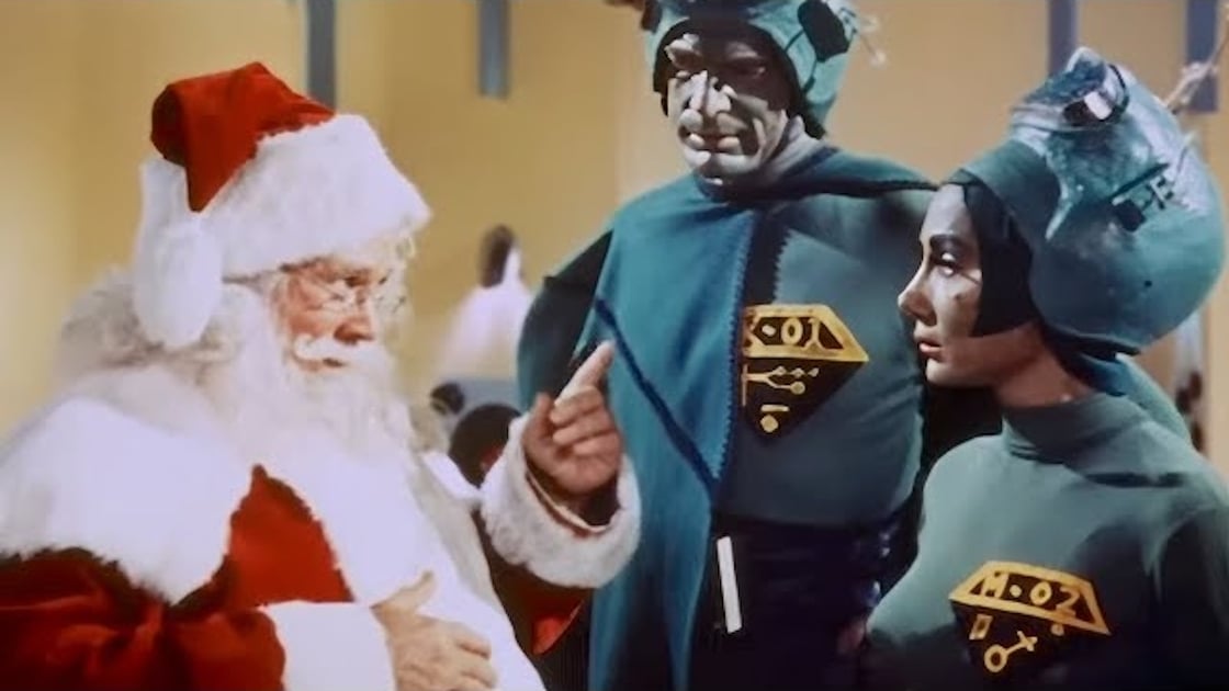 Santa and two martian parents in Santa Claus Conquers the Martians
