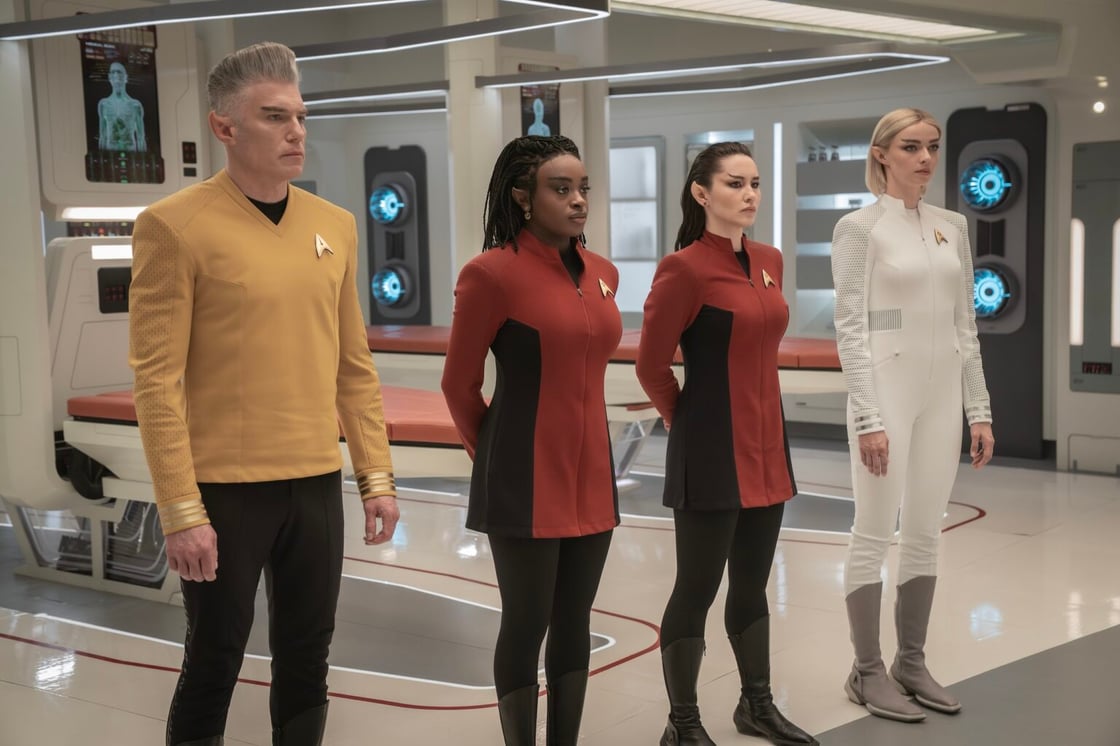 Anson Mount as Capt. Pike, Celia Rose Gooding as Uhura, Christina Chong as Laían and Jess Bush as Chapel all recently transformed into Vulcans in season 3 , Episode 8 of Strange New Worlds