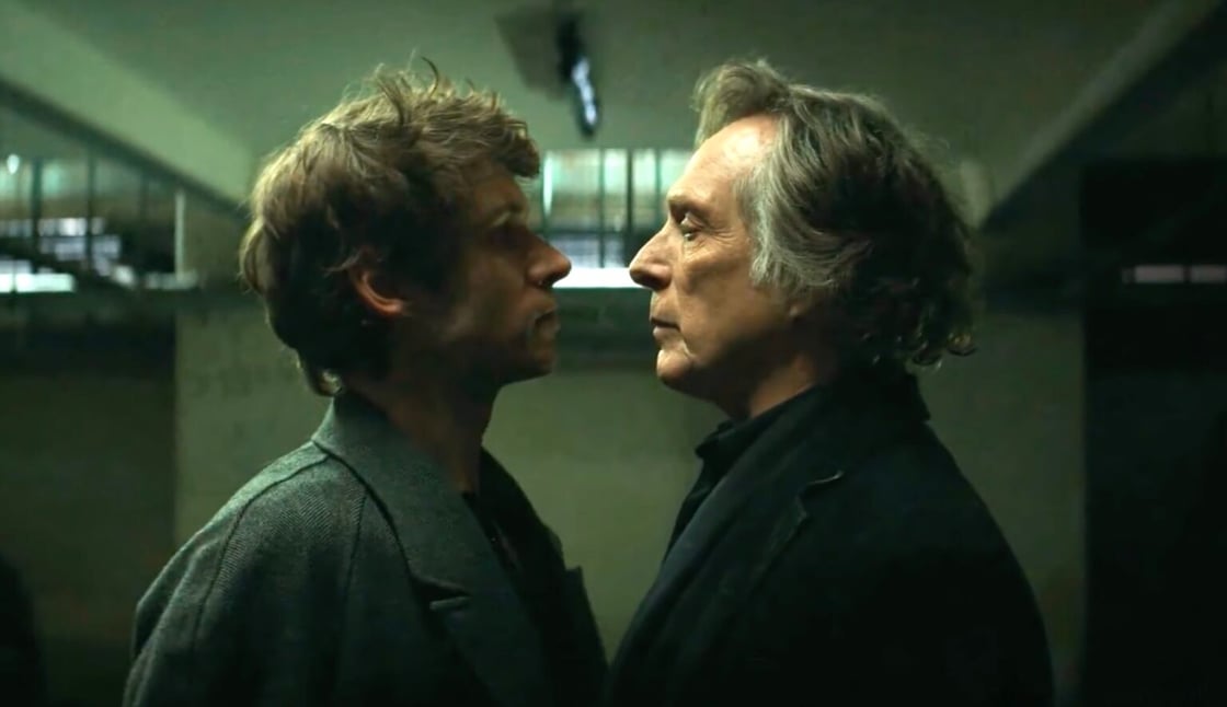 Jasper and Guy standing toe to toe in Talamasca: The Secret Order