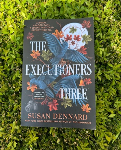 A bookstagram of an ARC of The Executioners Three by Susan Dennard