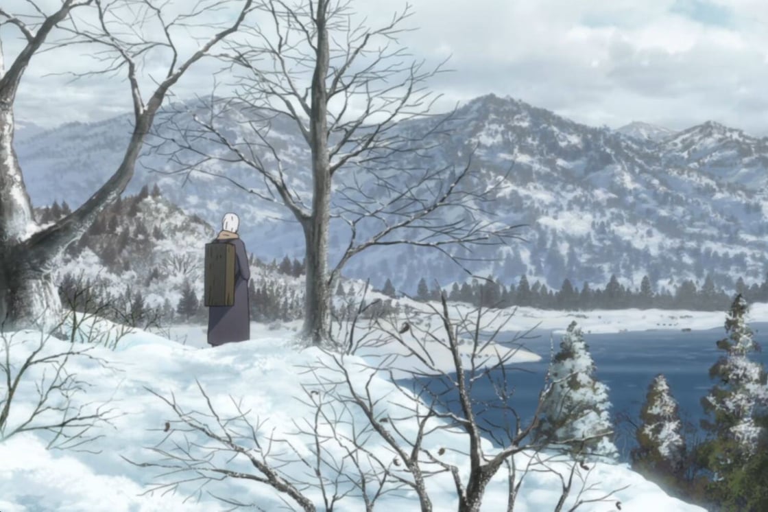 A screencap from Mushishi. Mushishi turns away from the camera, towards a snowy mountain lake