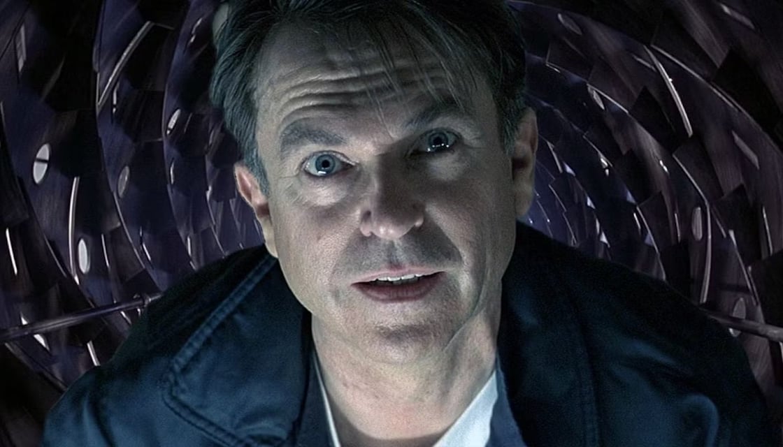 Sam Neill in Event Horizon, staring at the viewer