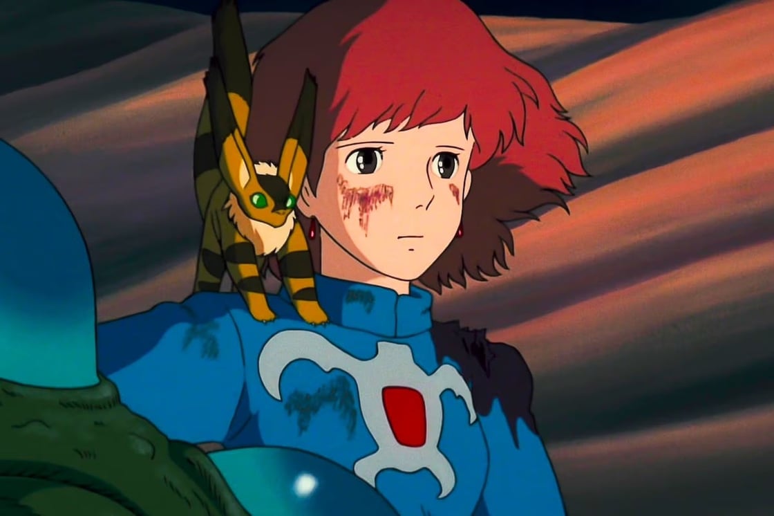 Image from Nausicaa of the Valley of the Wind; Princess Nausicaa looks into the distance, Teto on her shoulder