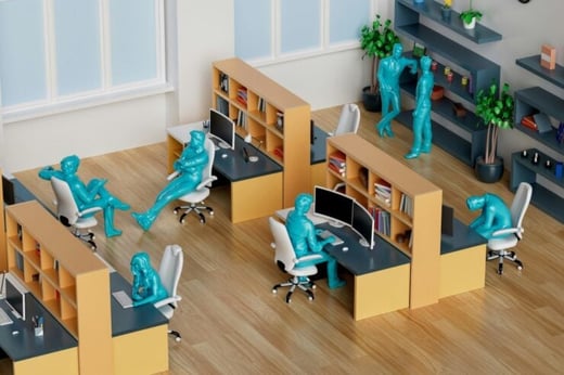 A small diorama of little blue action figures working in an office