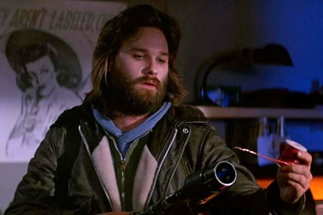 Kurt Russell in The Thing, heating up an unidentified object 